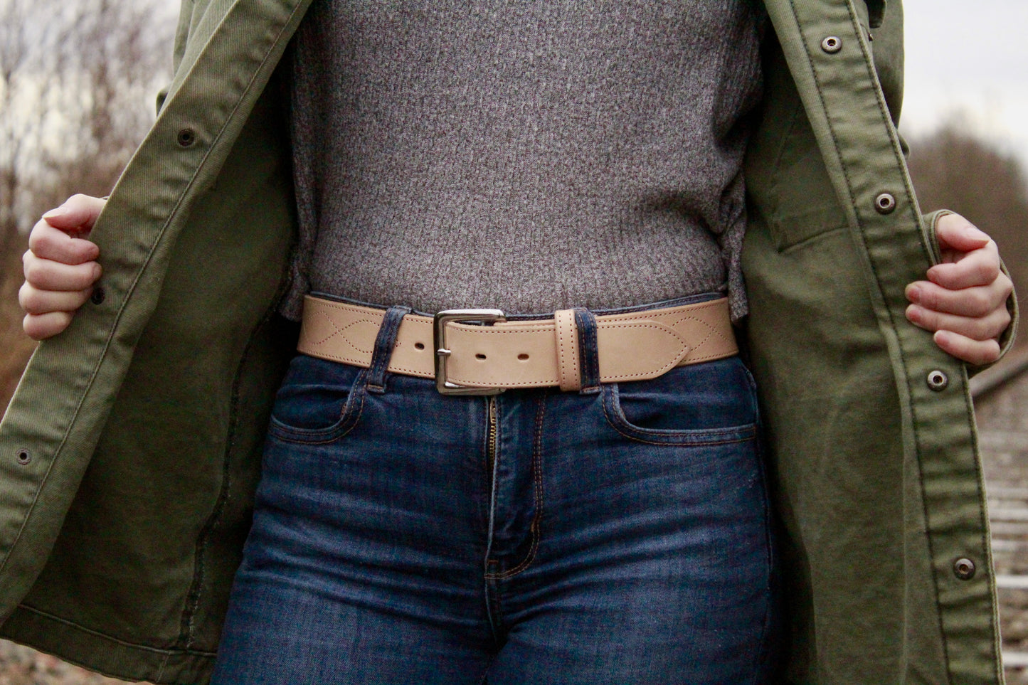 Evelyn Women's Leather Belt, closeup on person open jacket