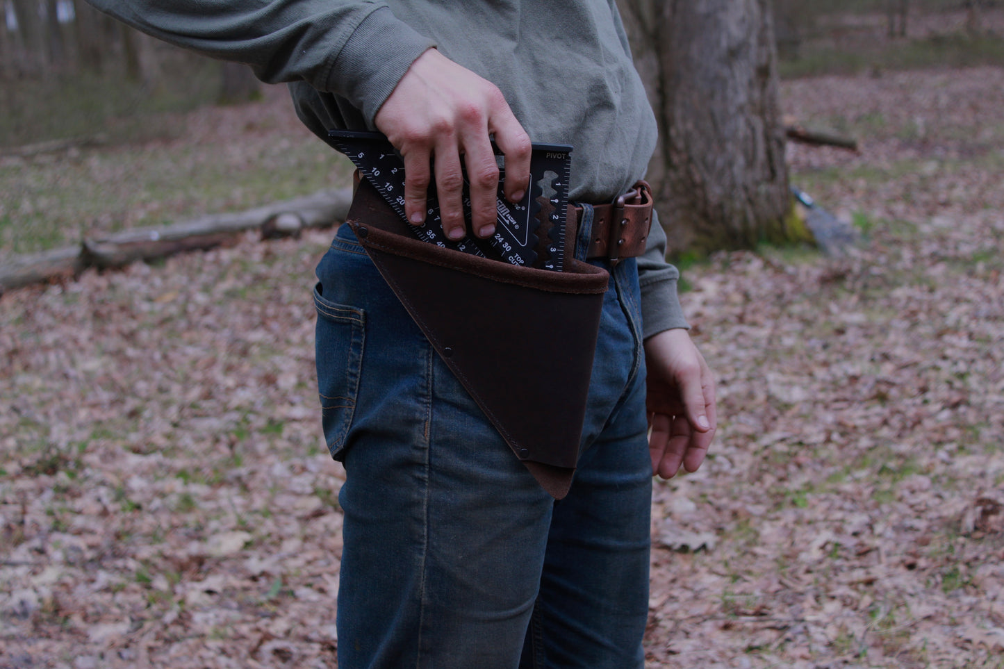 Leather Speed Square Holder, side view on person in motion