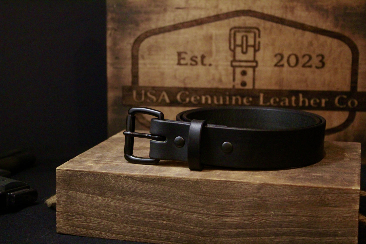 The Commander mens leather belt, black, front view rolled