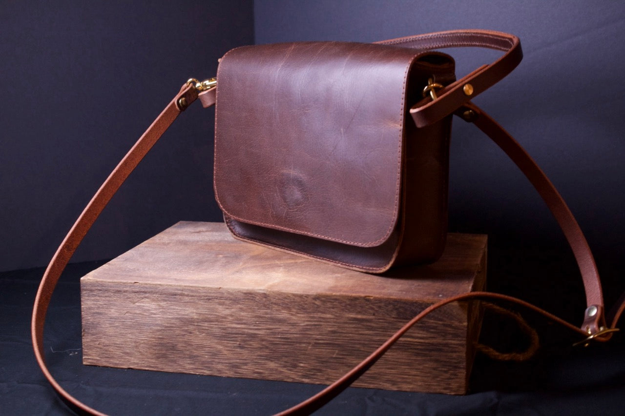 The Dixie Leather Handbag, brown women's purse, front right view long strap