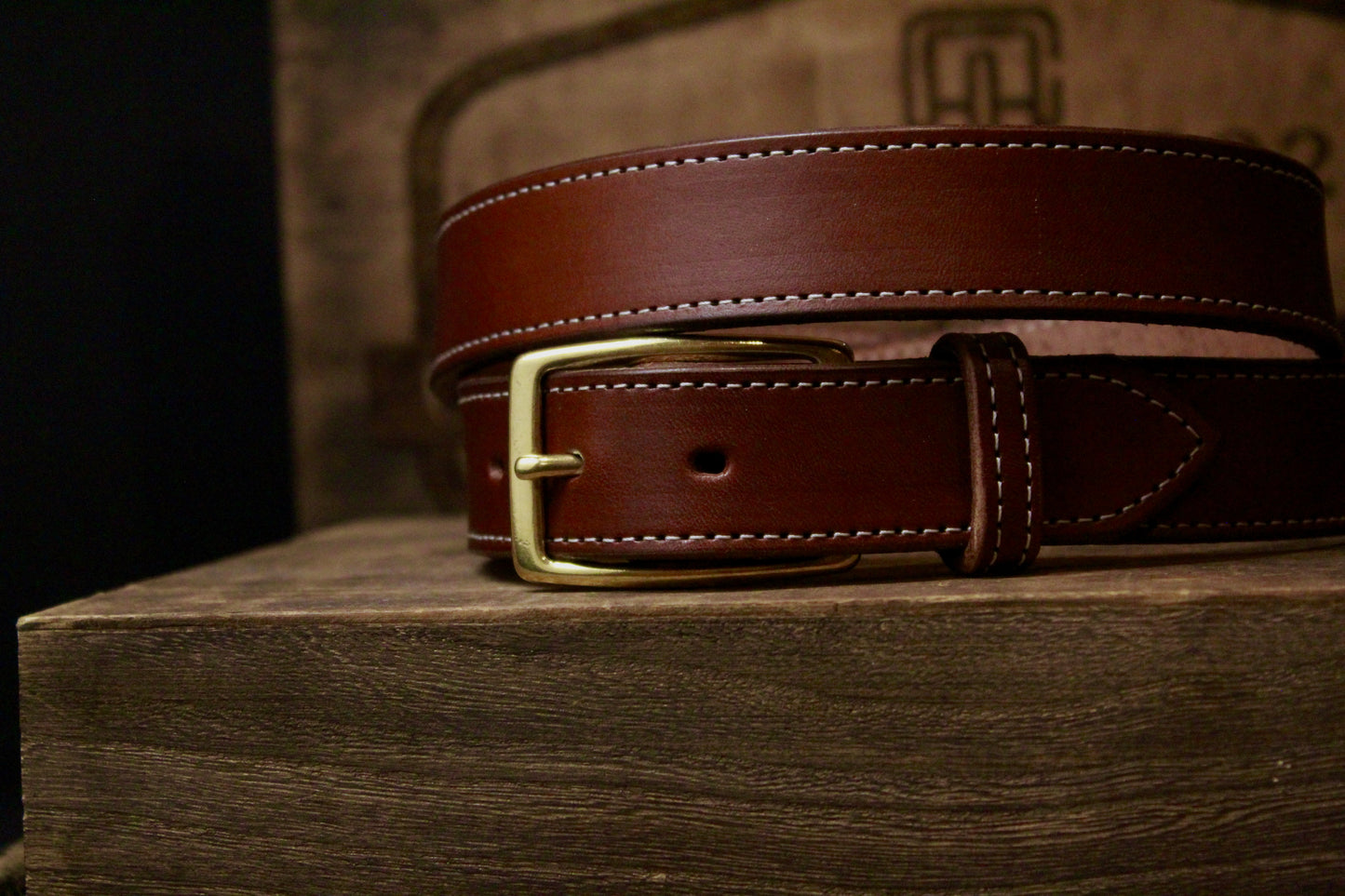 The Presidential mens leather belt , gold, front view buckled