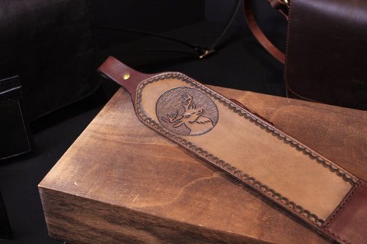 hand tooled leather rifle sling - hand tooled leather rifle strap - hand tooled leather gun sling - hand tooled leather gun strap - brown - for hunting - top front view