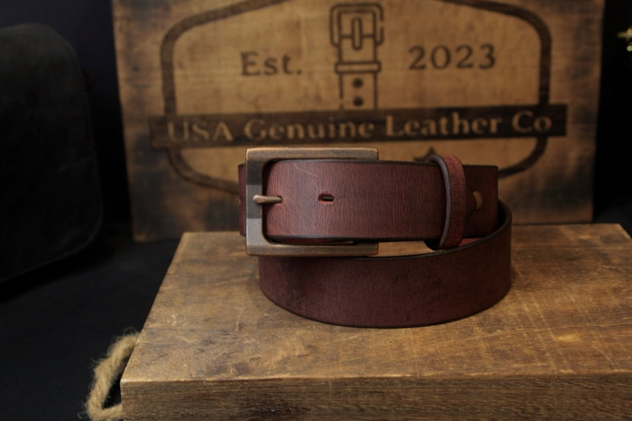 the oxblood mens leather belt, front view buckled