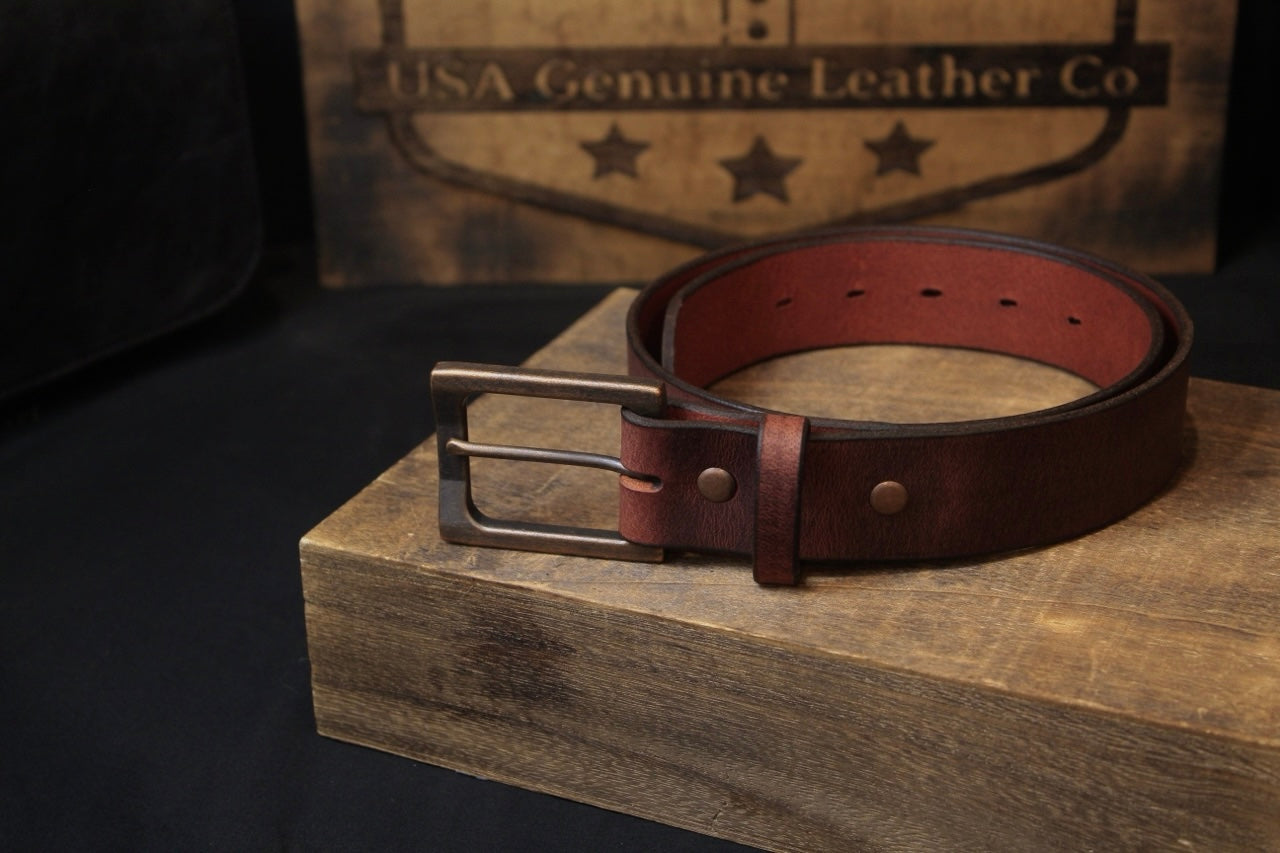 the oxblood mens leather belt, top right view rolled
